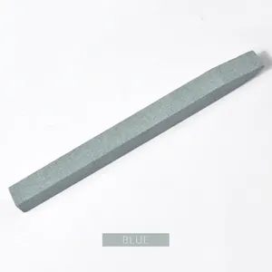 Blue quartz nail file stick for cuticle removal and nail surface polishing on white background