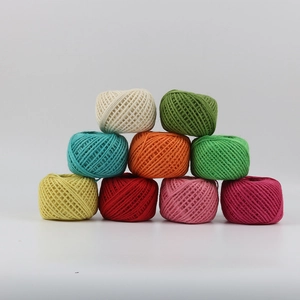 Macro view of colorful 1.5mm twine balls stacked for DIY craft and gift wrapping