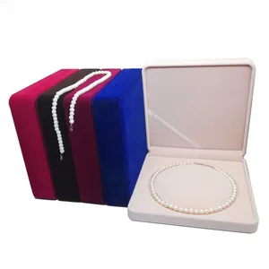 Detailed view of luxury velvet necklace gift boxes with soft lining and various colors