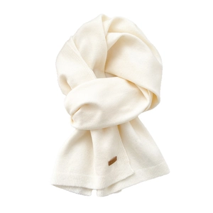 Classic cream knit scarf for women with a vintage leather patch for winter warmth