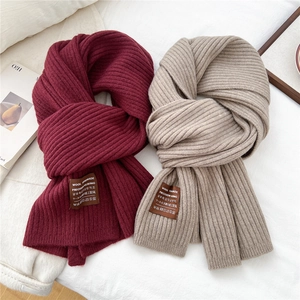 Striped knit scarves in burgundy and beige with wool handmade labels and rib texture