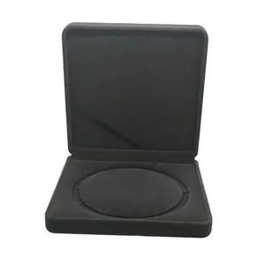 Macro shot of large black velvet jewelry box with round insert for necklace or medals