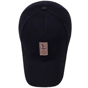 Black cotton baseball cap for men and women with brown leather EDIKO patch and visor