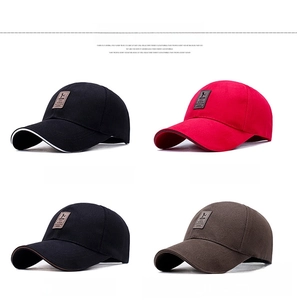 Matrix display showing cotton baseball caps in black, red and coffee colors with leather tags