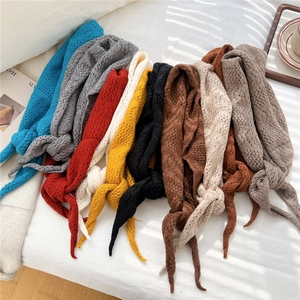 Chic hollow knit triangular scarf available in multiple vibrant colors with tie straps