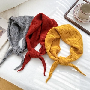 Handcrafted knit triangle scarf set in grey, red, and yellow with crochet hollow texture