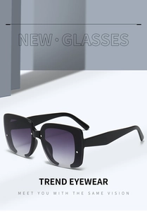 Detail view of square black glitter sunglasses with purple gradient lenses and rivets