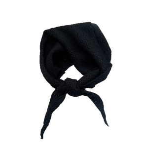 Black knit triangle scarf with crochet hollow pattern in a pre-knotted styling