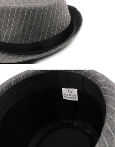 Detail of grey striped fedora hat showing fabric texture and inner size 58 label