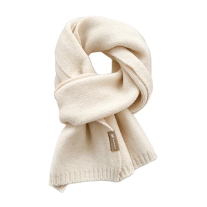 Minimalist cream knit scarf for winter with soft texture and leather brand label detail