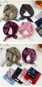 Detail of soft paisley cotton linen scarves in various vintage floral patterns and colors