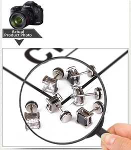Macro detail of six-piece set square cubic zirconia earrings in black and white stones