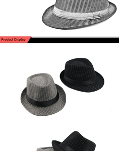 Detail view of classic striped fedora hats in black and gray with elegant ribbon bands