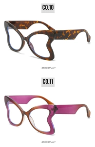 Detail view of leopard print and purple gradient butterfly sunglasses with wide temples