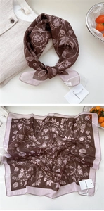 Detail of soft cotton linen paisley scarf with elegant vintage floral patterns