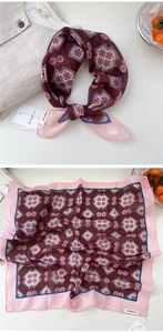 Detailed pattern of a chestnut and pink geometric square scarf with navy blue borders