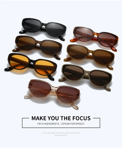 Flat lay of retro oval sunglasses in seven trendy colors with polished frames