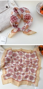 Detailed close-up of geometric pattern cotton linen square scarf with yellow stitched edges