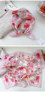 Detailed view of pink floral cotton linen scarf with soft rose print and fine stitching