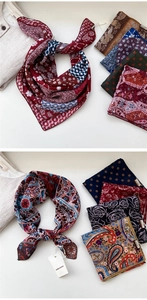 Detail of linen-silk neck scarves with paisley and floral prints in rich vintage tones