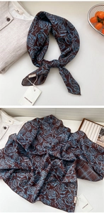 Detail view of double-sided paisley cotton linen scarf with vintage blue rose patterns