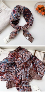 Detail of vintage paisley linen-cotton scarf showing 100% polyester tag and texture