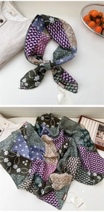 Detailed texture of a vintage cotton linen scarf with paisley and floral patterns