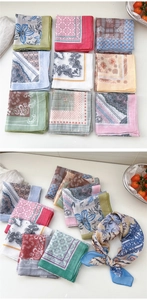 Close-up of floral cotton linen square scarves with vintage patterns and texture details