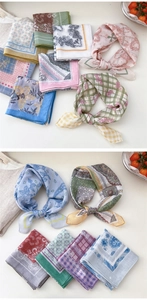 Detailed flat lay of colorful floral paisley cotton linen neck scarves for women