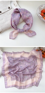 Close-up of lilac floral cotton linen scarf with plaid and polka dot border details