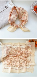Detailed view of peach floral paisley cotton linen feel scarf with delicate hemmed edges