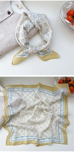 Detailed view of floral cotton linen square scarf with yellow border and blue tile pattern