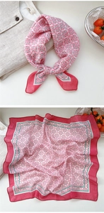 Close-up of pink floral linen-cotton square scarf with vintage geometric flower patterns