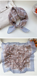 Detail of floral plaid cotton linen scarf showing retro patterns and soft texture