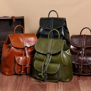 Set of oil-wax leather backpacks in brown, green, black and dark coffee colors