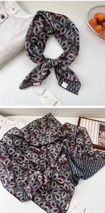 Vue détaillée d'un foulard rétro en polyester aux motifs bohèmes de plumes bleues et brunes