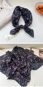 Détail d'un foulard en soie vintage avec motif paisley et texture drapée élégante