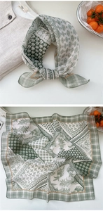 Detailed macro view of retro cotton linen floral square scarf in forest green and beige colors