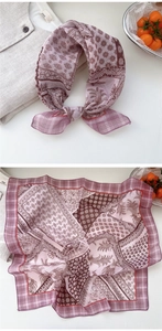 Detail of pink cotton linen scarf featuring botanical and geometric patchwork patterns