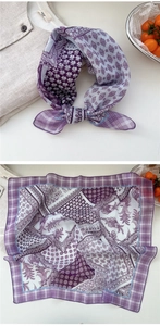 Macro detail of breathable purple floral linen scarf with geometric patterns and checkered border