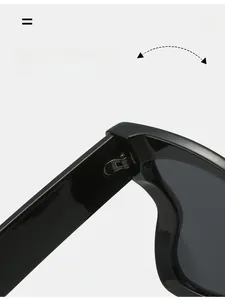 Detail of durable metal texture hinge and smooth black frame on modern women sunglasses