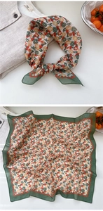 Detail of vintage dark green floral cotton linen square scarf with bow styling detail