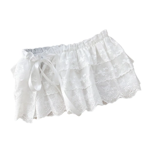 Extension de jupe en dentelle blanche à fleurs avec fermeture par ruban satin