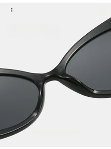 Detail of ergonomic nose pads on black cat-eye sunglasses for comfortable long-term wear