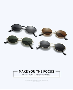 Detail view of retro oval sunglasses with metal frames and multiple lens color options