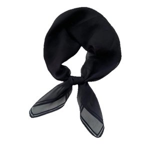 Elegant solid black sheer silk square scarf with knotted design on white background