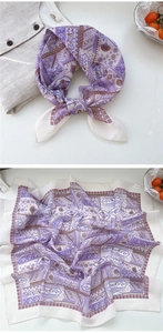 Close-up of elegant purple floral silk scarf showing premium texture and vintage patterns