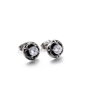 Vintage titanium steel stud earrings with white zircon and intricate carved details