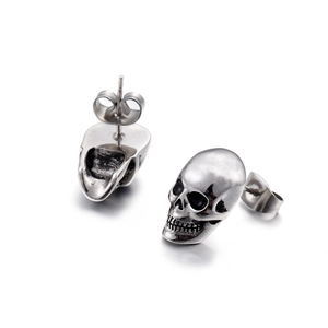 Men's titanium steel skull stud earrings with polished silver finish and secure backing