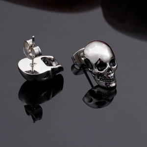 Polished silver skull stud earrings for men made of durable stainless steel